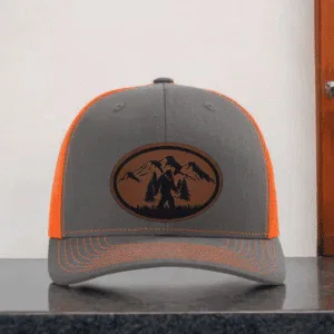 Outdoor Trucker Hat with Bigfoot Patch – Forest Mountain Scene Cap for Nature Lovers