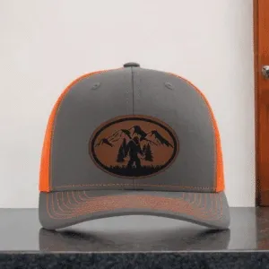 Outdoor Trucker Hat with Bigfoot Patch – Forest Mountain Scene Cap for Nature Lovers