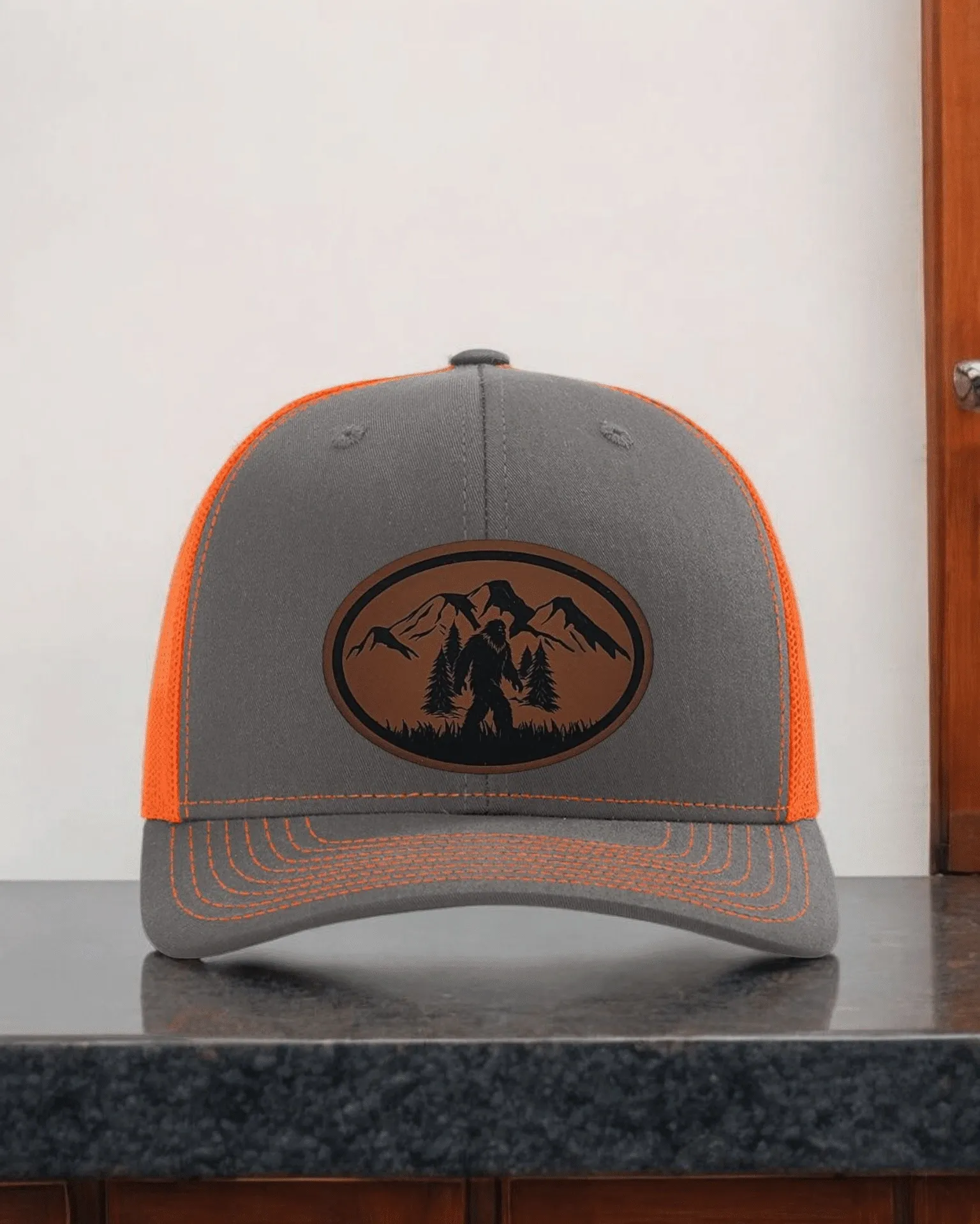 Outdoor Trucker Hat with Bigfoot Patch - Forest Mountain Scene Cap for Nature Lovers