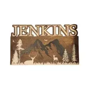 A rustic name sign featuring a forest scene